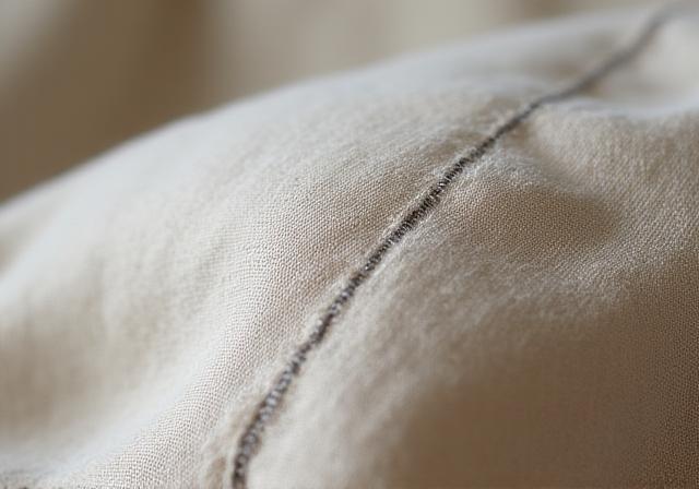 Close up of organic fabric textures and recycled packaging